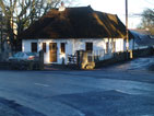 Photo of the construction of a thatched cottage, built by Atfar Construction