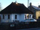 Photo of the construction of a thatched cottage, built by Atfar Construction